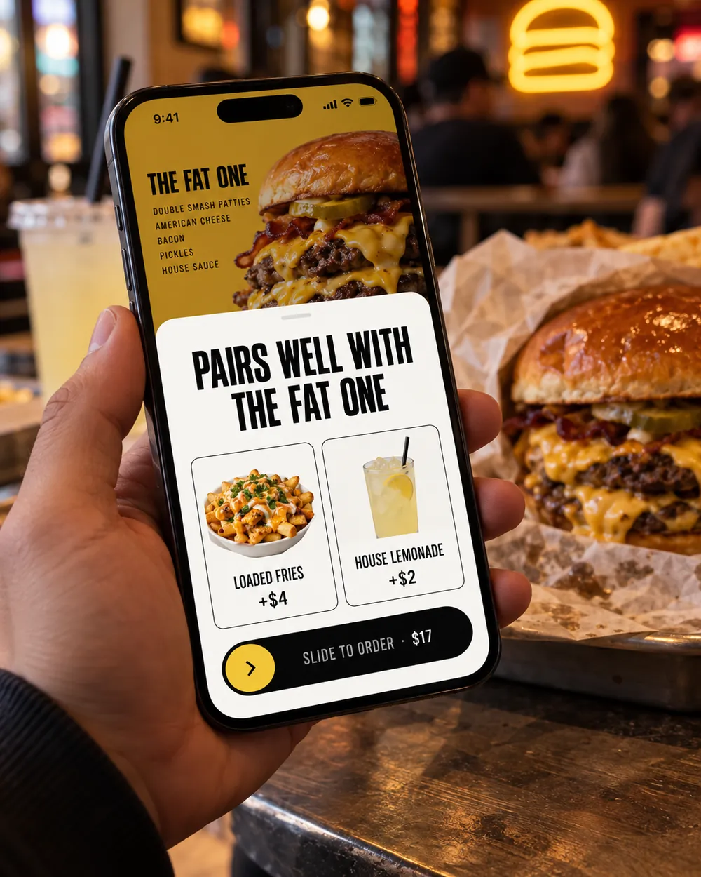 A guest's phone at Fat Kafta suggesting loaded fries and a lemonade with The Fat One.